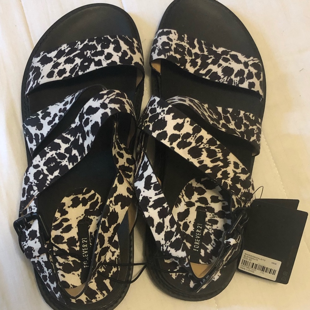 Cow print brand new sandals- never worn